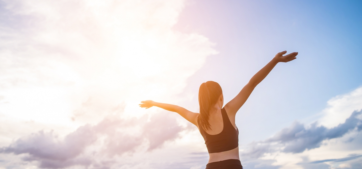 athletic-woman-with-arms-outstretched